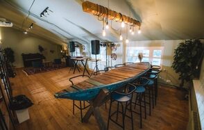 Loft with bar counter and wooden floor