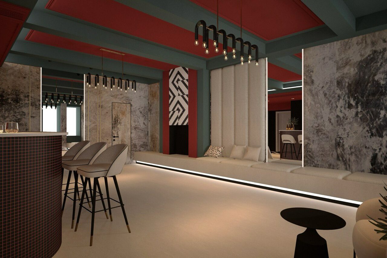 Арендовать Стильное пространство Астрид. Современное пространство с барной стойкой и высокими стульями, длинный диван вдоль стены, декоративные панели с узором, подвесные светильники, красные и серые оттенки, открытая планировка, нейтральная цветовая гамма.