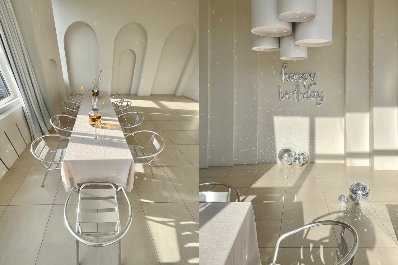 Арендовать Роскошный панорамный лофт . Панорамные окна, залитые солнечным светом. Стол со стульями. Кровать. Диван с журнальным столиком